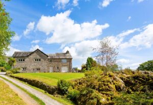 Panoramic summer view of Cartmel Hill holiday cottage