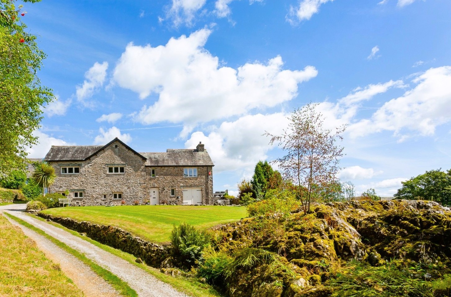 Panoramic summer view of Cartmel Hill holiday cottage
