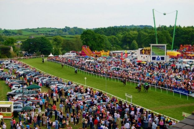Horses racing at Cartmel Racecourse