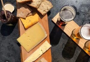 Photo of a cheese and beer platter in Cartmel