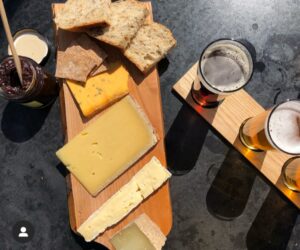 Photo of a cheese and beer platter in Cartmel
