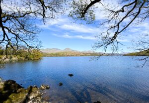 Panoramic view of Coniston Water on a clear spring morning.