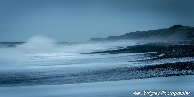 Waves crashing on a beach in Cumbria