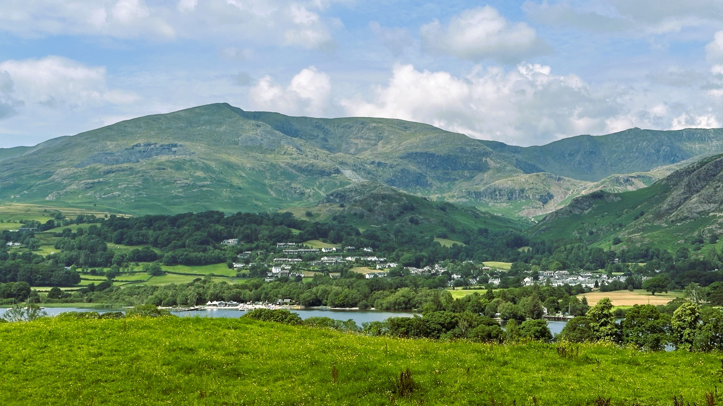 Photo of Coniston Village and the Coniston mountains