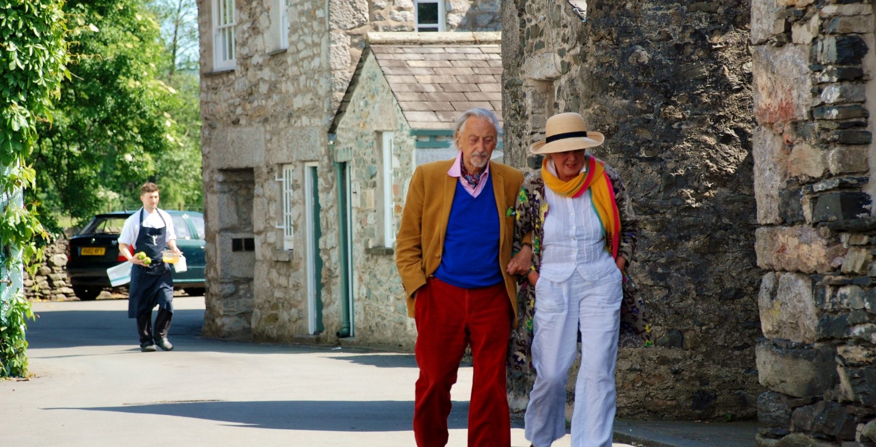 Image of Couple walkin past L'Enclume in Cartmel