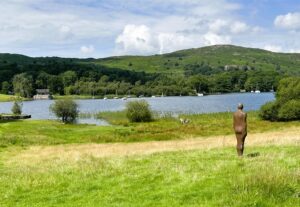 An Anthony Gormley statue at Coniston Water
