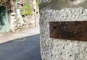 The iconic discrete entrance of L'Enlume.