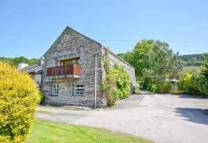 Charcoal House in summer