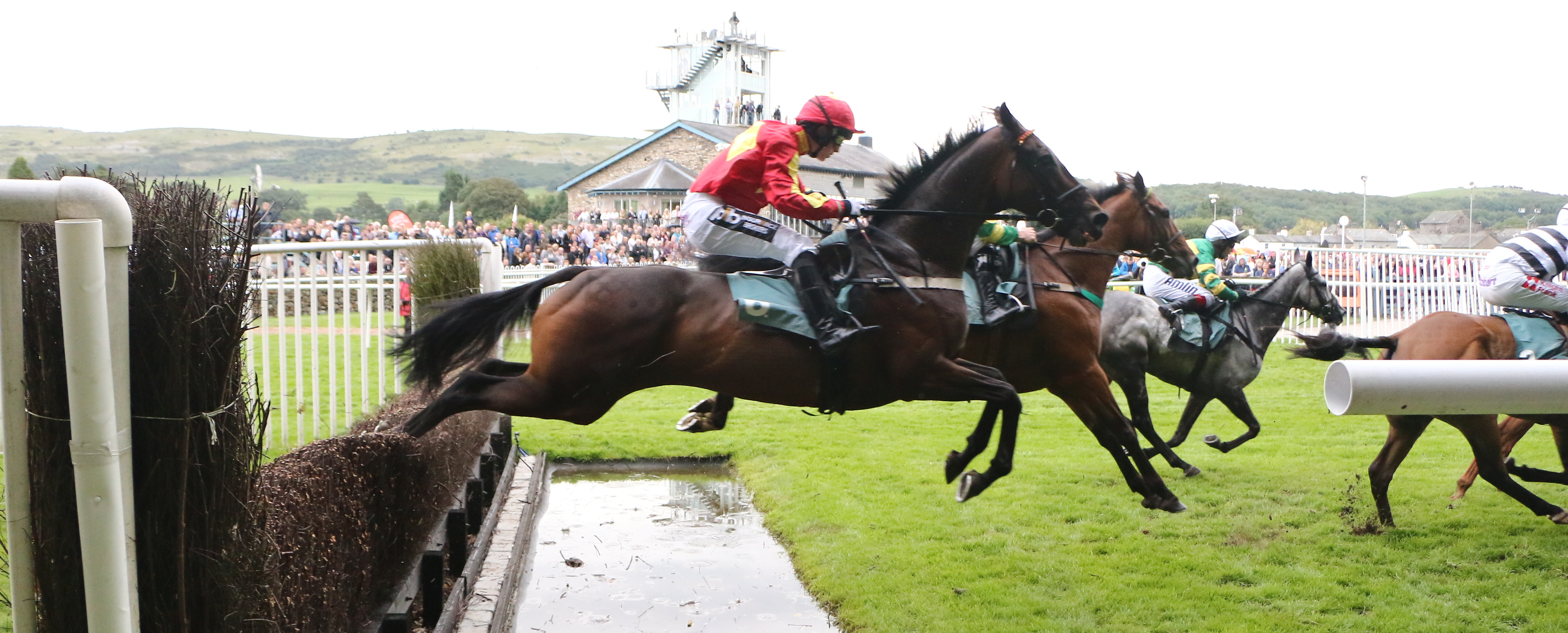 Jumping the fences at Cartmel Races