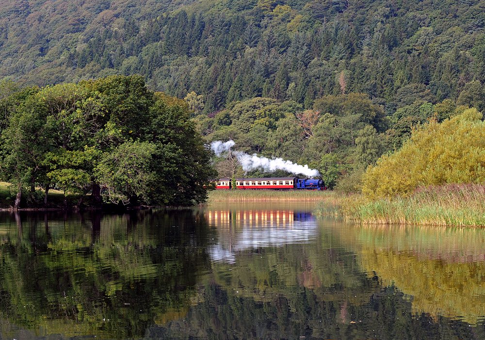 Steam Train travelling along Lake Windermere