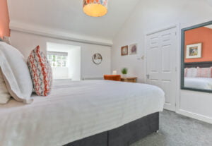 Image of an upstairs king sized bedroom