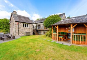 The rear garden and summer house at Cartmel Hill in the South Lakes